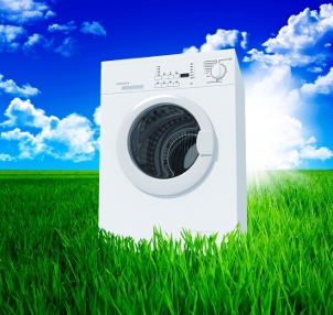 washing machine and green field with blue sky 3d background